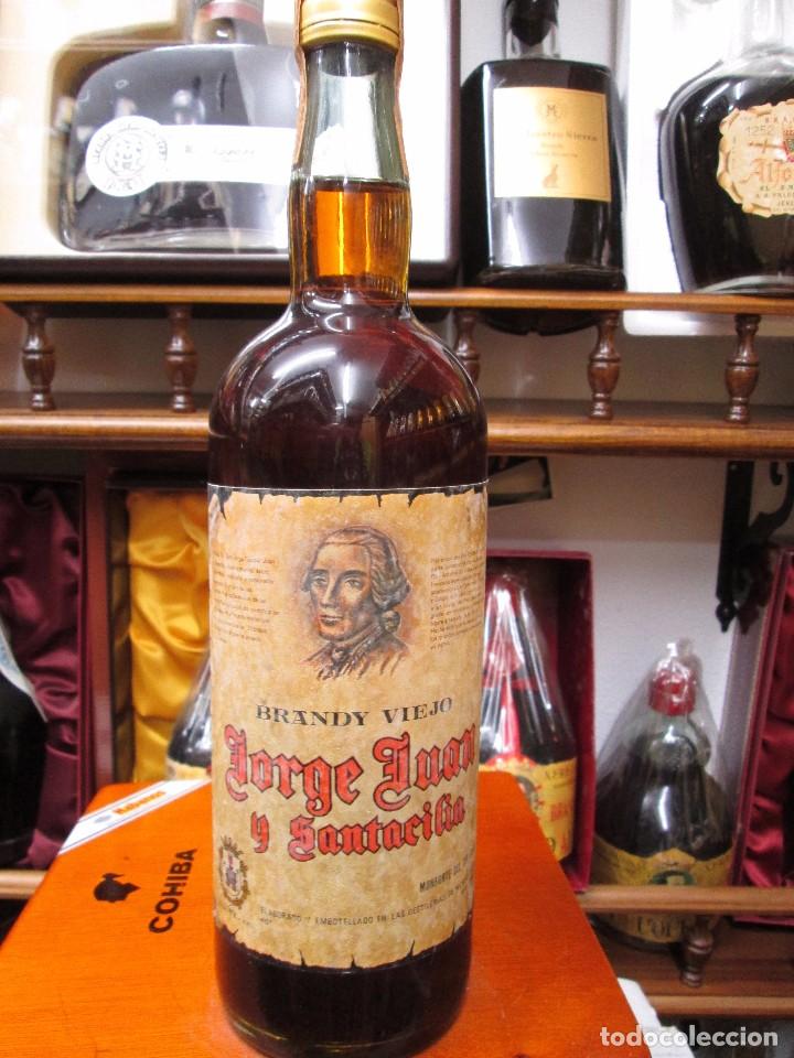 Coleccionismo de vinos y licores: ANTIGUA BOTELLA BRANDY CO&Ntilde;AC,JORGE JUAN Y SANTACILIA DE IMPUESTO DE 4 PTS DECADA A&Ntilde;OS 60-70