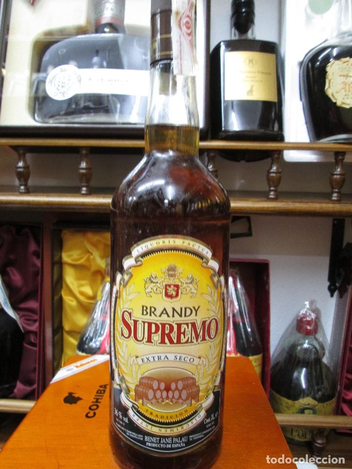 Coleccionismo de vinos y licores: ANTIGUA BOTELLA BRANDY CO&Ntilde;AC, SUPREMO EXTRA SECO, EMBOTELLADO POR BENET JAN&Egrave; PALAU, EL VENDRELL