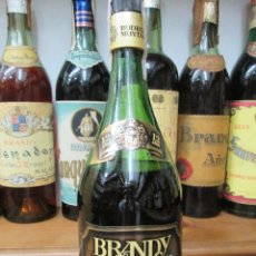 Coleccionismo de vinos y licores: ANTIGUA BOTELLA BRANDY COÑAC, DON JUAN GRAN RESERVA 12 AÑOS LUXE IMPUESTO DE 4 PTS. DECADA 70-80