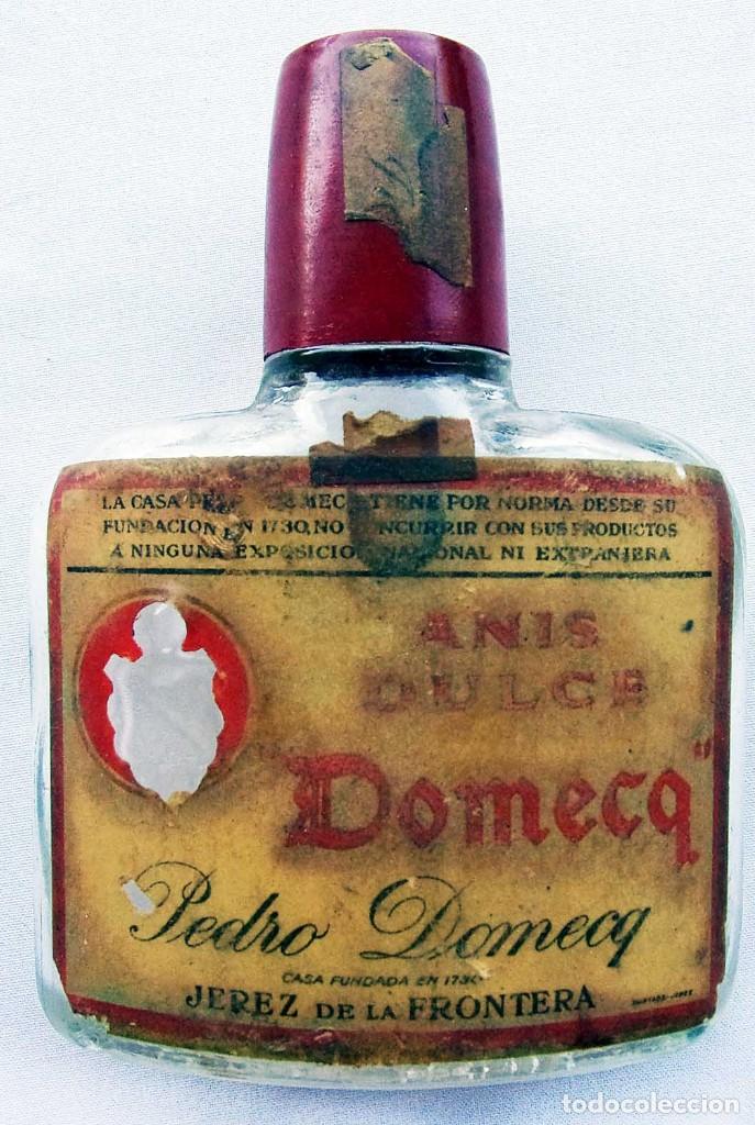 Coleccionismo de vinos y licores: PEDRO DOMECQ. JEREZ. PEQUE&Ntilde;A BOTELLA DE ANIS DULCE DOMECQ. BOTELLIN DE CRISTAL VACIO.