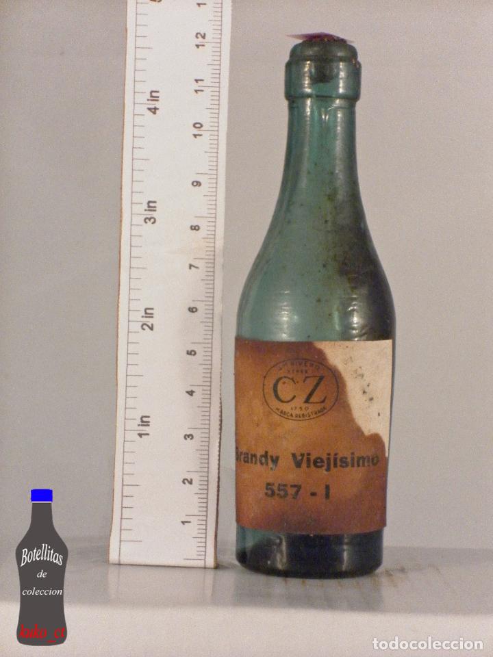 Coleccionismo de vinos y licores: BOTELLITA BOTELLIN BRANDY VIEJISIMO 557 - 1 CZ JM RIVERO JEREZ DE LA FRONTERA