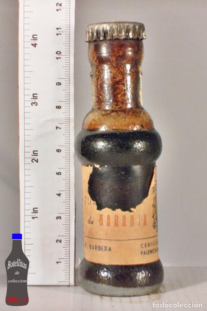 Collection of wines and liquors: BOTELLITA BOTELLIN ZUMO DE NARANJA F. BARBERA CENTELLES VALENCIA TAPON CORONA