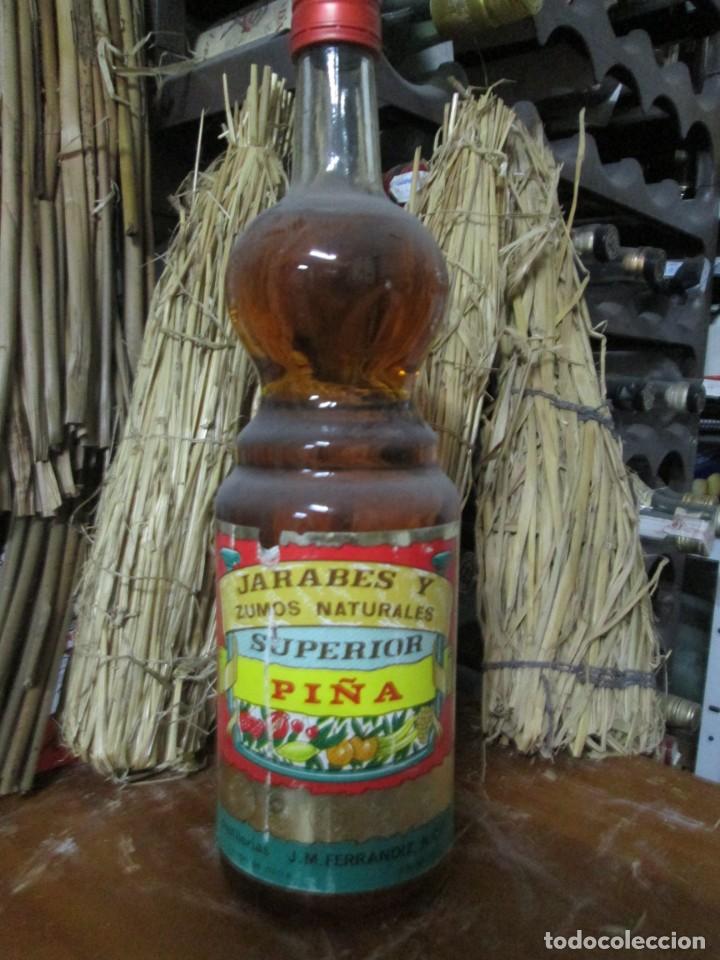 Coleccionismo de vinos y licores: ANTIGUA BOTELLA BRANDY CO&Ntilde;AC, JARABE DE PI&Ntilde;A, DESTILERIAS J.M. FERRANDIZ, CAMPO DE MIRRA ALICANTE