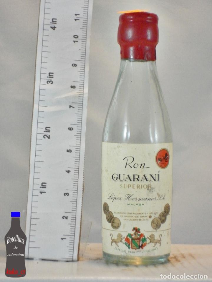 Collection of wines and liquors: BOTELLITA BOTELLIN RON GUARANI SUPERIOR LOPEZ HERMANOS MALAGA