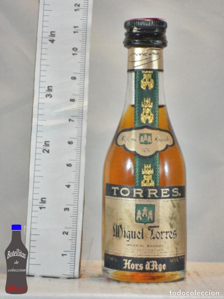Coleccionismo de vinos y licores: BOTELLITA BOTELLIN TORRES HORS D AGE IMPERIAL BRANDY MIGUEL TORRES VILLAFRANCA DEL PENEDES BARCELONA