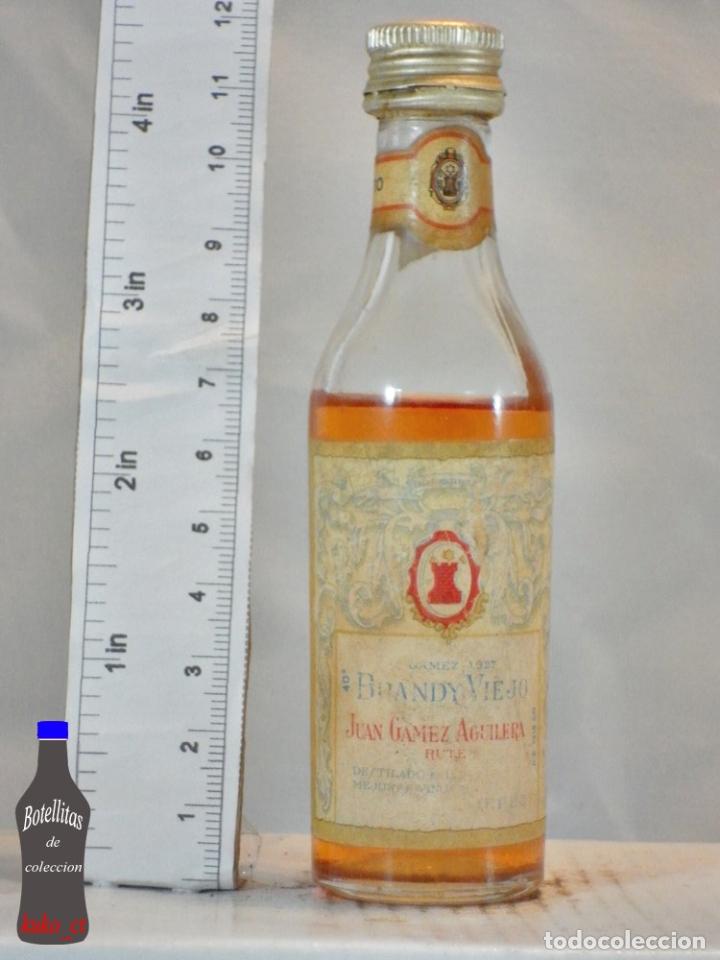 Coleccionismo de vinos y licores: BOTELLITA BOTELLIN BRANDY VIEJO 1927 JUAN GAMEZ AGUILERA RUTE JEREZ