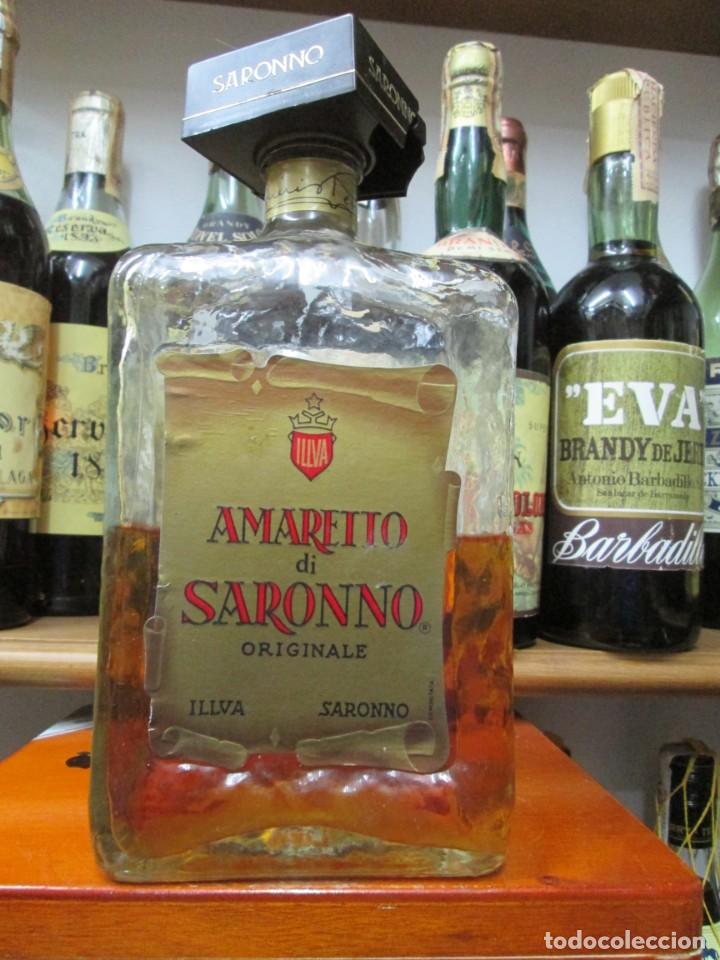Coleccionismo de vinos y licores: ANTIGUA BOTELLA BRANDY CO&Ntilde;AC,LICOR AMARETO DI SARONO ORIGINAL ITALIA