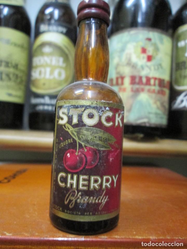 Coleccionismo de vinos y licores: ANTIGUO BOTELLIN BRANDY CO&Ntilde;AC, CHERRY BRANDY STOCK 11 CM