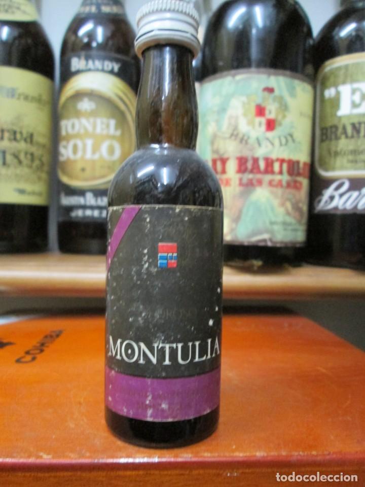 Coleccionismo de vinos y licores: ANTIGUO BOTELLIN BRANDY CO&Ntilde;AC, MONTULIA OLOROSO 11 CM ALTURA