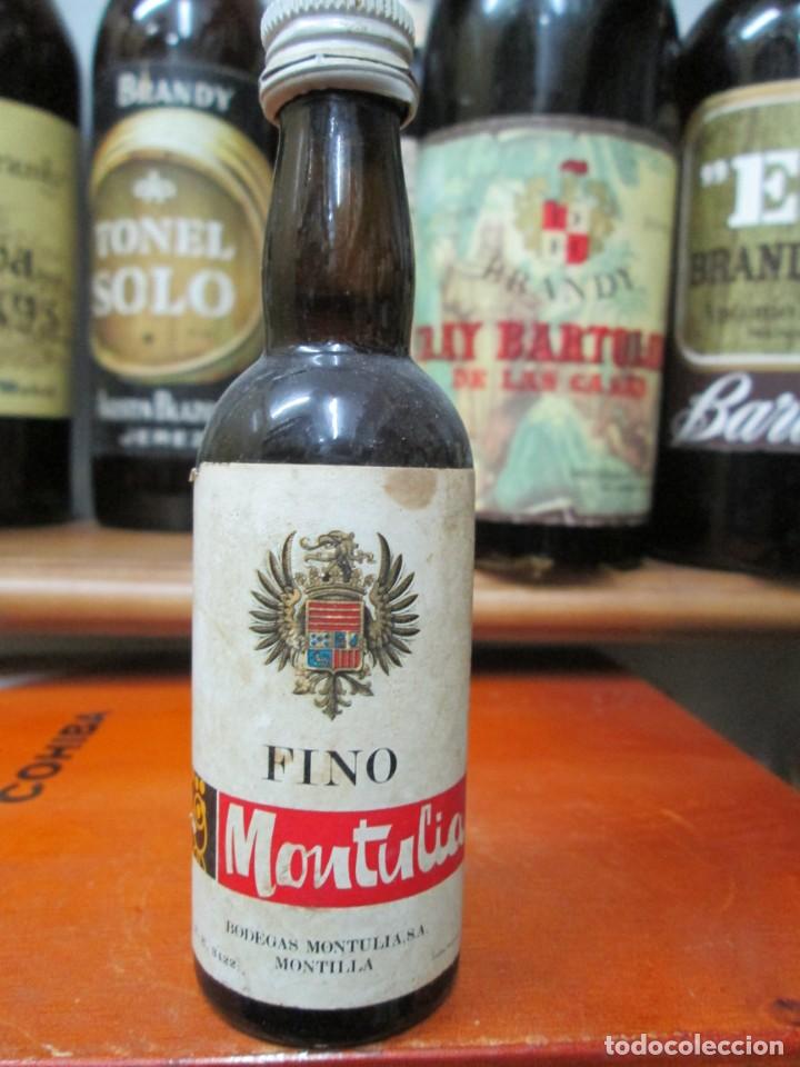 Coleccionismo de vinos y licores: ANTIGUO BOTELLIN BRANDY CO&Ntilde;AC, FINO MONTULIA 11 CM ALTURA