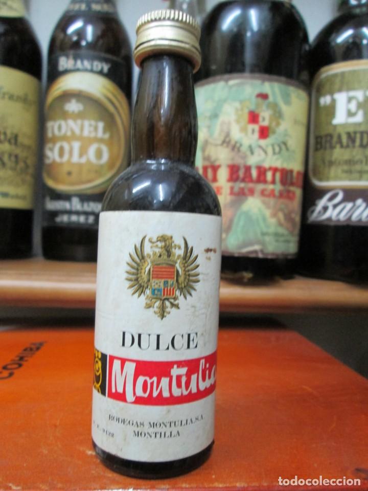 Coleccionismo de vinos y licores: ANTIGUO BOTELLIN BRANDY CO&Ntilde;AC, DULCE MONTULIA 11 CM ALTURA