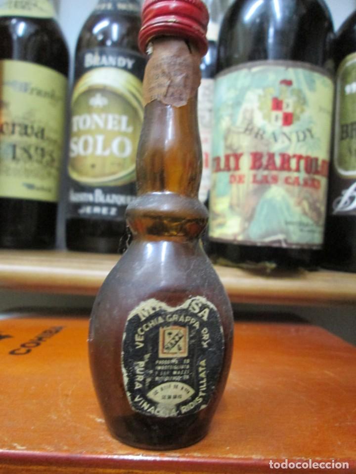Coleccionismo de vinos y licores: ANTIGUO BOTELLIN BRANDY CO&Ntilde;AC, VECHHIA GRAPPA DRY 11 CM ALTURA