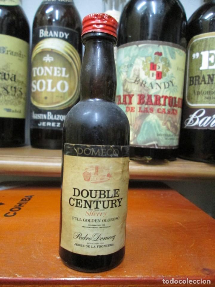 Coleccionismo de vinos y licores: ANTIGUO BOTELLIN BRANDY CO&Ntilde;AC, GOLDEN OLOROSO DE DOMECQ SHERRY 11 CM