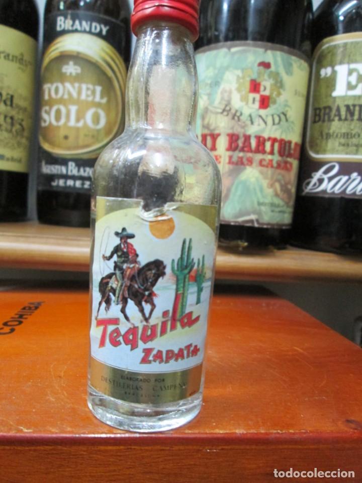 Coleccionismo de vinos y licores: ANTIGUO BOTELLIN BRANDY CO&Ntilde;AC, TEQUILA ZAPATA DESTILERIAS CAMPENY 11 CM