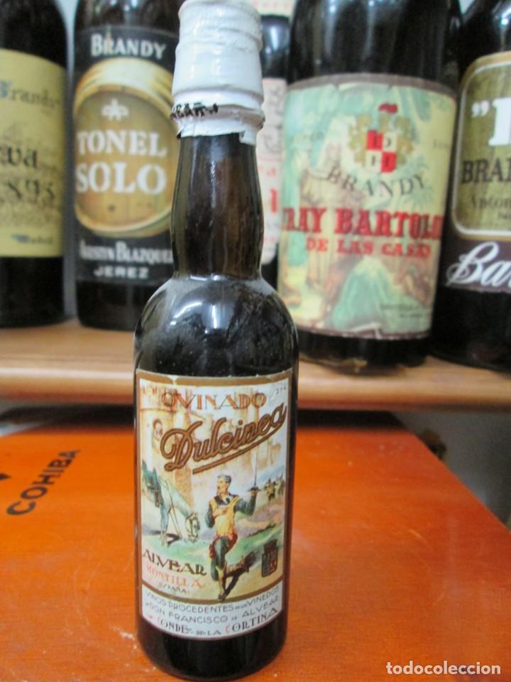 Coleccionismo de vinos y licores: ANTIGUO BOTELLIN BRANDY CO&Ntilde;AC, QUINADO DULCINEA DE ALVEAR MONTILLA