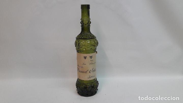 Collection of wines and liquors: ANTIGUA BOTELLA COGNAC CO&Ntilde;AC DANIEL ORTIZ JATIVA , MEDIDA DE ALTO 32 CM. ESTA VACIA.
