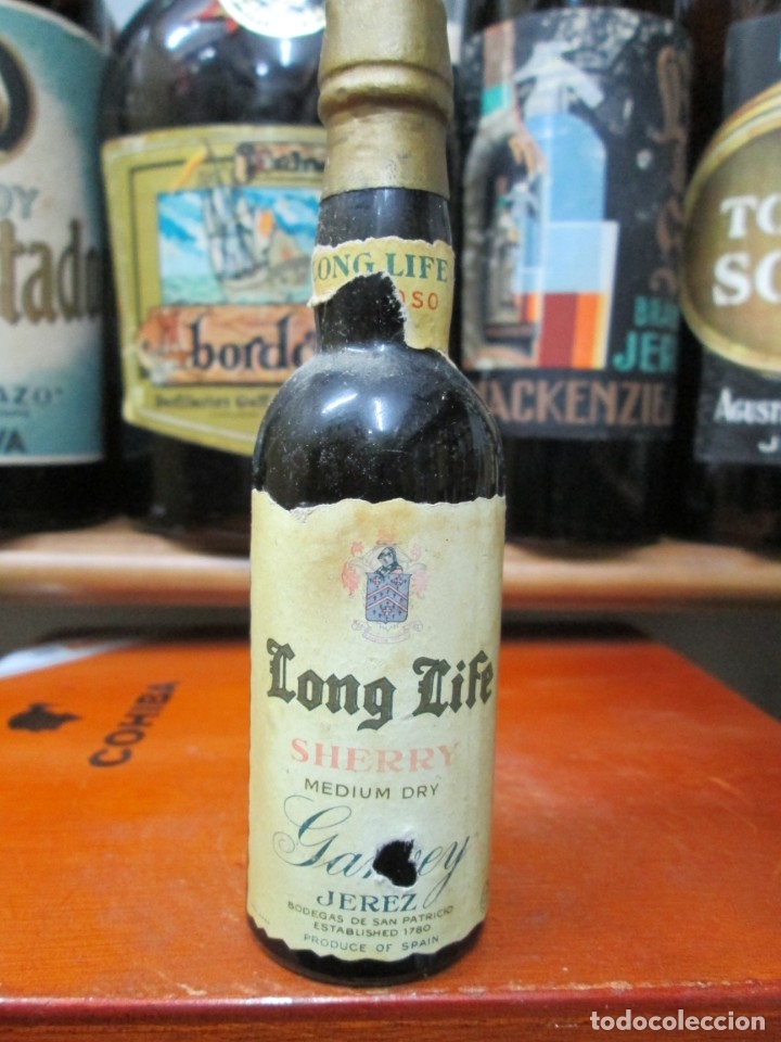 Coleccionismo de vinos y licores: ANTIGUO BOTELLIN BRANDY CO&Ntilde;AC, LONG LIFE SHERRY MEDIUM DRY
