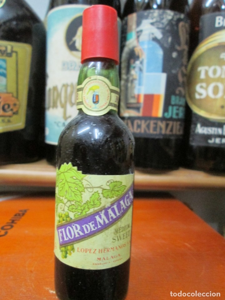 Coleccionismo de vinos y licores: ANTIGUO BOTELLIN BRANDY CO&Ntilde;AC,FLOR DE MALAGA, DE LOPEZ HERMANOS