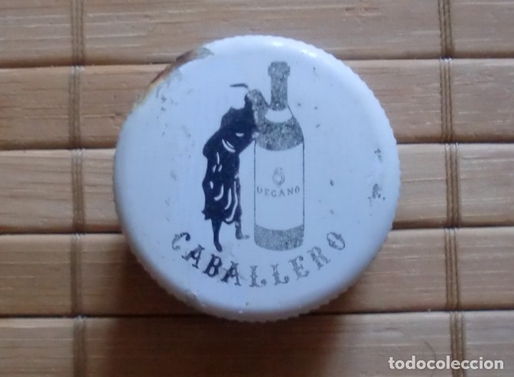 Coleccionismo de vinos y licores: Tap&oacute;n met&aacute;lico de Brandy Decano Caballero
