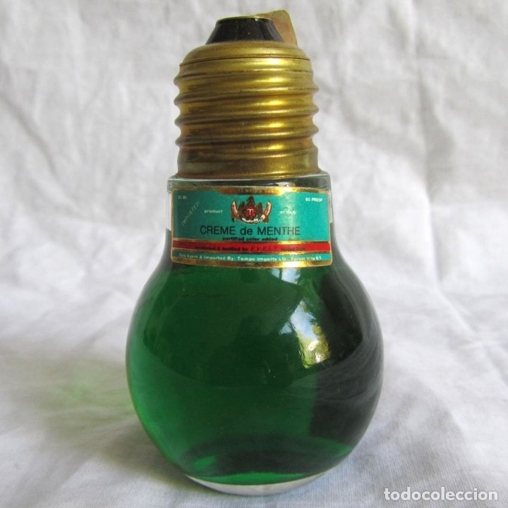 Coleccionismo de vinos y licores: Botella de crema de menta en forma de bombilla, sin abrir