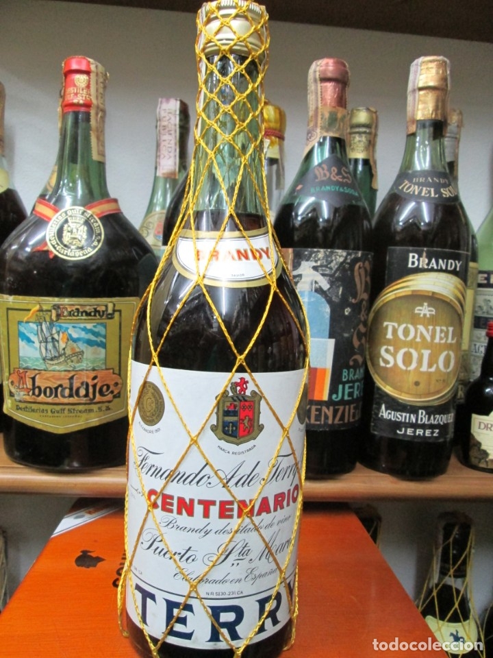 Coleccionismo de vinos y licores: ANTIGUA BOTELLA BRANDY CO&Ntilde;AC,CENTENARIO TERRY DE IMPUESTO DE 4 PTS. DECADA 60-70