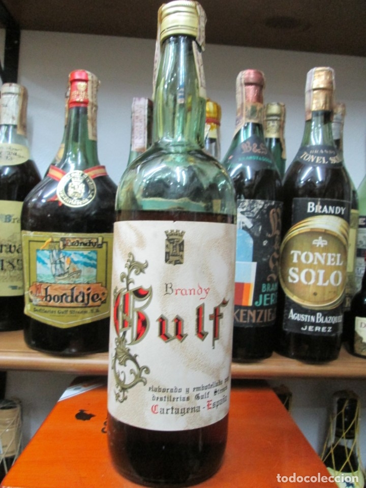 Coleccionismo de vinos y licores: ANTIGUA BOTELLA BRANDY CO&Ntilde;AC, GULF DESTILERIAS GULF CARTAGENA, IMPUESTO DE 4 PTS, DECADA-60-70