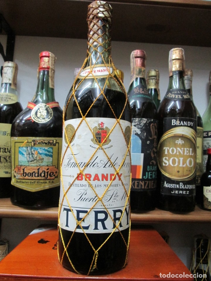Coleccionismo de vinos y licores: ANTIGUA BOTELLA BRANDY CO&Ntilde;AC, CENTENARIO TERRY , IMPUESTO DE 4 PTS. DECADA 60-70-