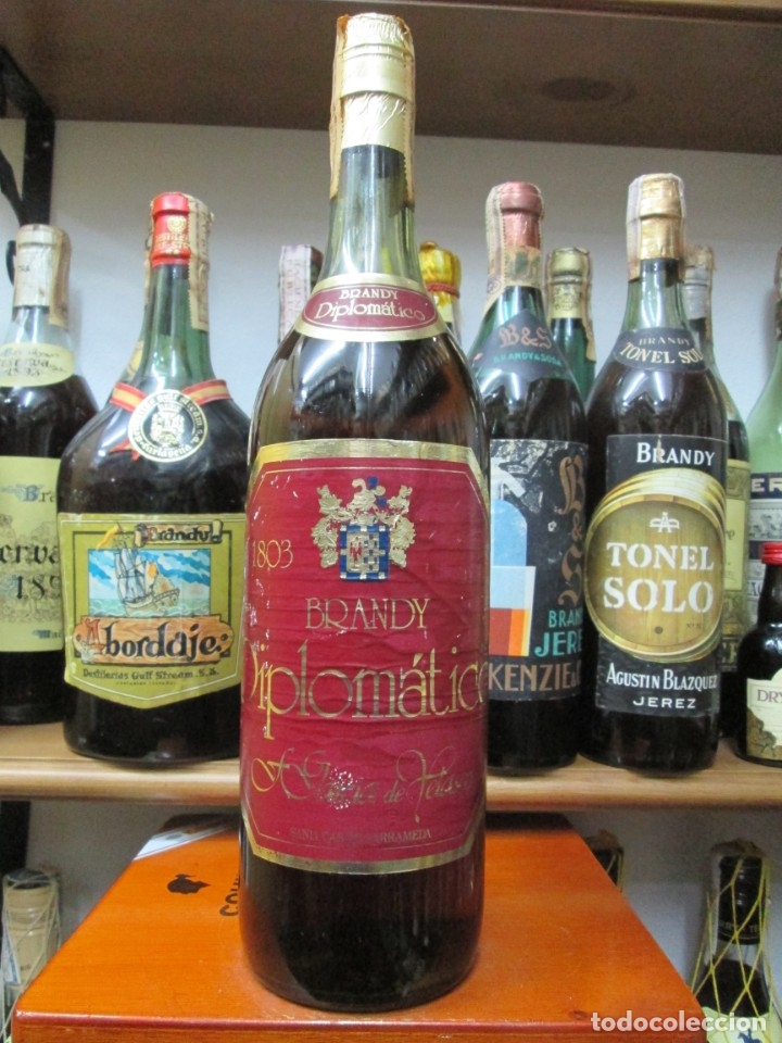 Coleccionismo de vinos y licores: ANTIGUA BOTELLA BRANDY CO&Ntilde;AC,DIPLOMATICO DE F&ordm; GARCIA DE VELASCO, IMPUESTO DE 4 PTS. DECADA 60-70