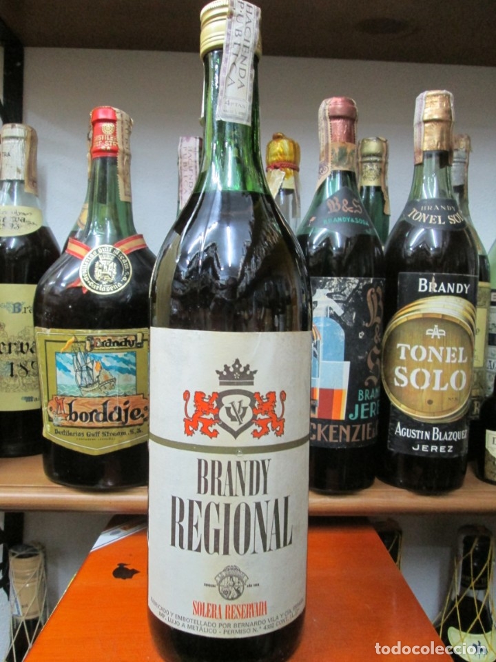 Coleccionismo de vinos y licores: ANTIGUA BOTELLA BRANDY CO&Ntilde;AC, REGIONAL SOLERA ESPECIAL, DE IMPUESTO DE 4 PTS, DECADA 60-70