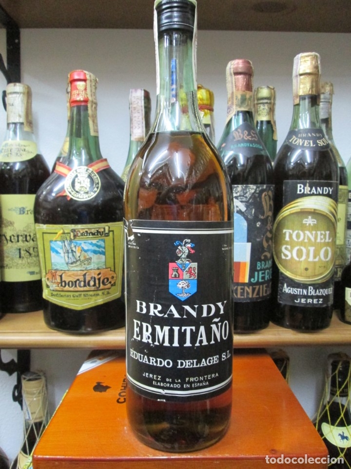 Coleccionismo de vinos y licores: ANTIGUA BOTELLA BRANDY CO&Ntilde;AC,ERMITA&Ntilde;O DE EDUARDO DELAGE, DE IMPUESTO DE 4 PTS. DECADA-60-70