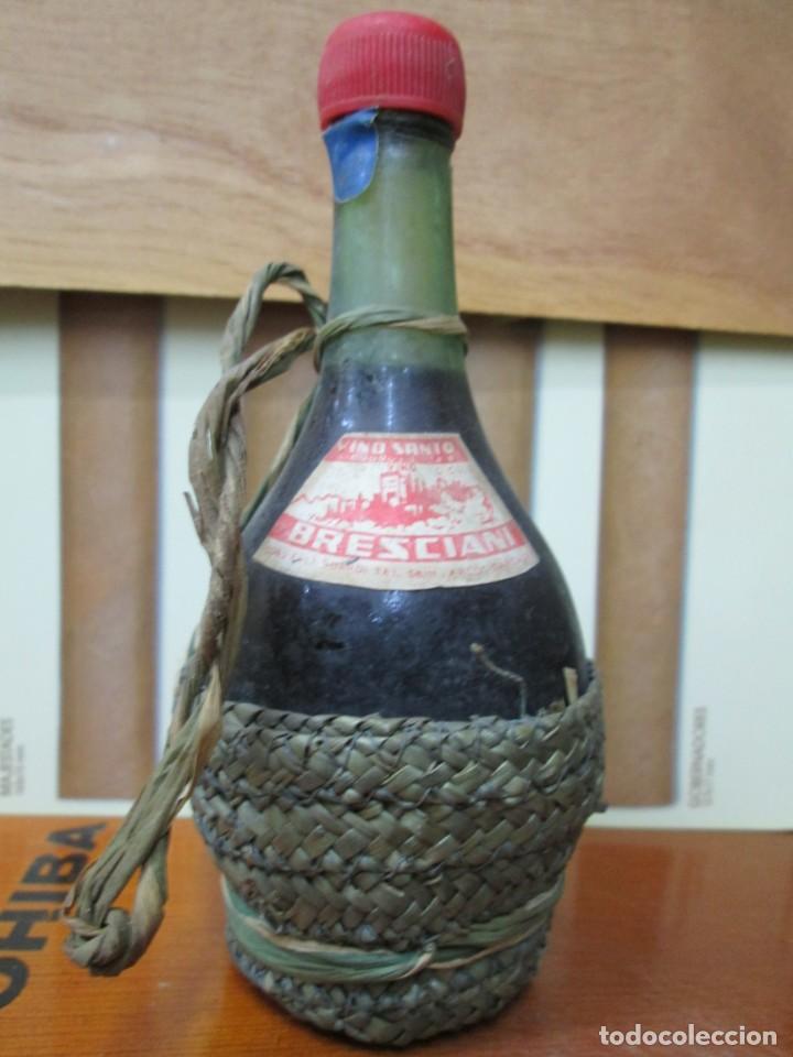 Collection of wines and liquors: ANTIGUO BOTELLIN, VINO SANTO BRESCIANI.