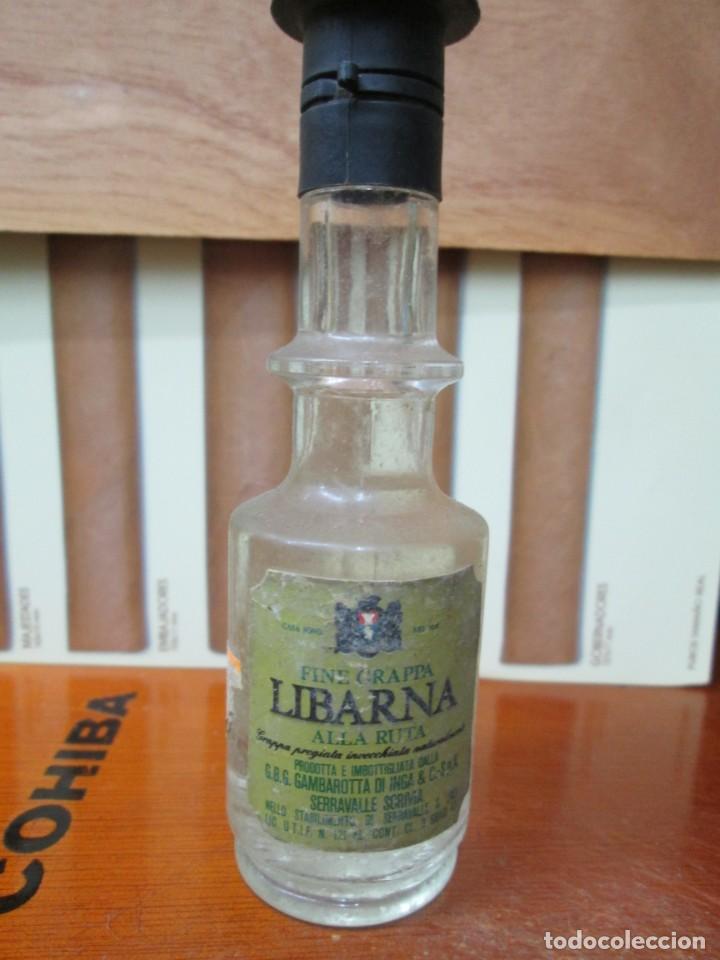 Sammlung von Weinen und Lik&ouml;ren: ANTIGUO BOTELLIN , FINE GRAPA LIBARNA ALLA RUTA