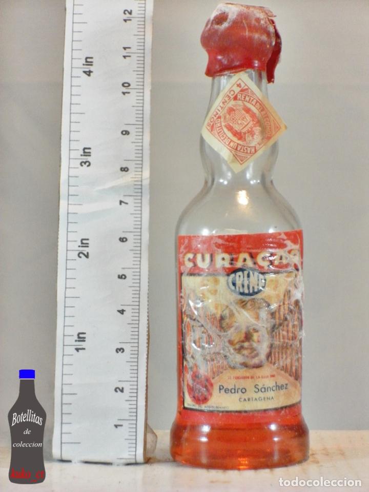 Coleccionismo de vinos y licores: BOTELLITA BOTELLIN CURACAO CREMA LICOR 49 PEDRO SANCHEZ CARTAGENA