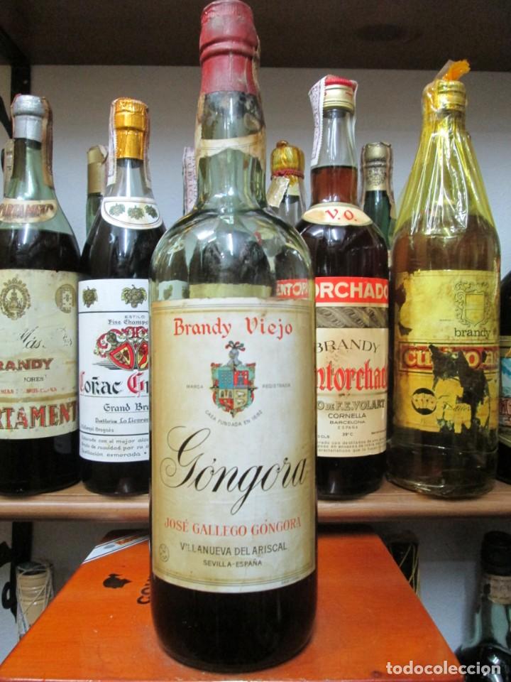 Coleccionismo de vinos y licores: ANTIGUA BOTELLA BRANDY CO&Ntilde;AC,VIEJO GONGORA DE IMPUESTO DE 4 PTS. DECADA 60-70