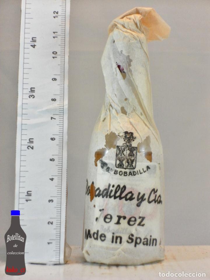 Coleccionismo de vinos y licores: BOTELLITA BOTELLIN BRANDY VIEJISIMO 103 BOBADILLA Y CIA. MANUEL FERNANDEZ JEREZ DE LA FRONTERA PAPEL