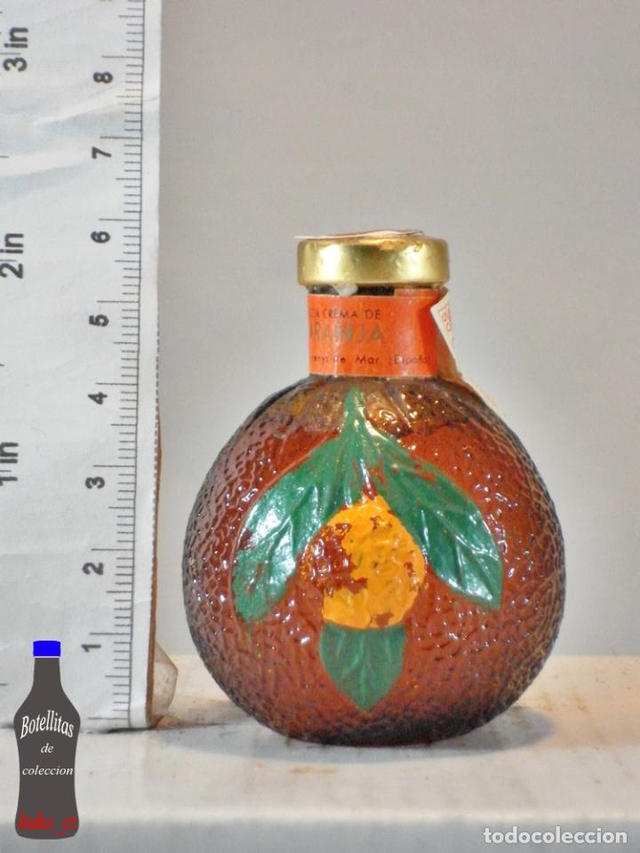 Collection of wines and liquors: BOTELLITA BOTELLIN CREMA DE NARANJA DESTILERIAS MOLLFULLEDA S.A. ARENYS DE MAR ESPA&Ntilde;A