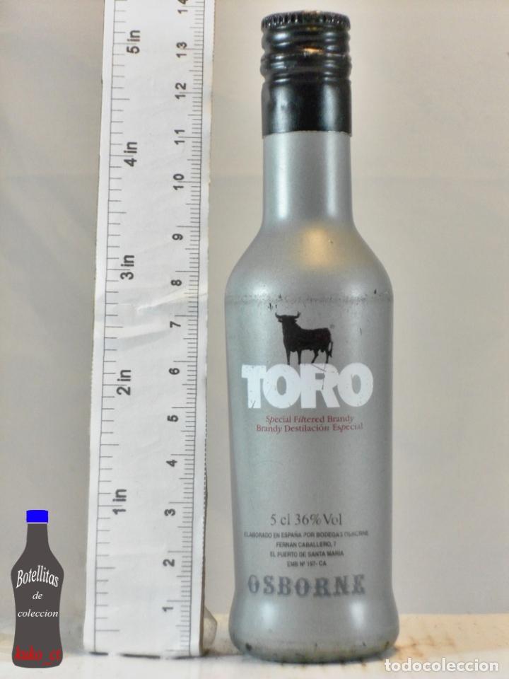Coleccionismo de vinos y licores: BOTELLITA BOTELLIN BRANDY TORO BODEGAS OSBORNE PUERTO DE SANTA MARIA