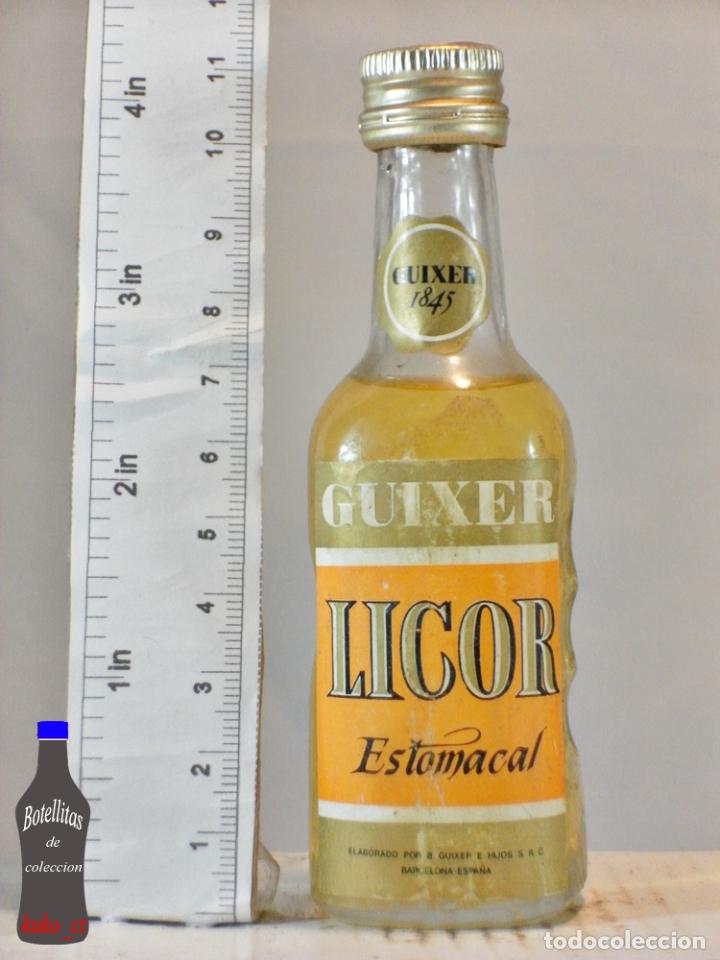 Coleccionismo de vinos y licores: BOTELLITA BOTELLIN LICOR ESTOMACAL B. GUIXER E HIJOS S.R.C. BARCELONA ESPA&Ntilde;A