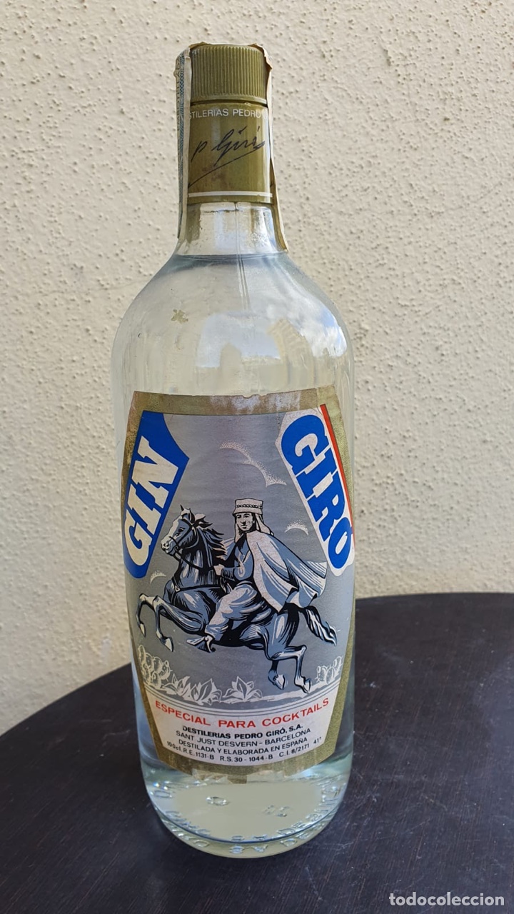 Coleccionismo de vinos y licores: Botella de ginebra gin giro sello de 8 pesetas