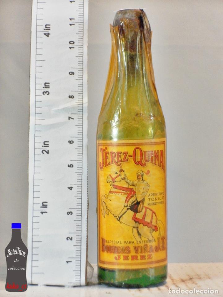 Coleccionismo de vinos y licores: BOTELLITA BOTELLIN JEREZ QUINA TONICO BODEGAS VI&Ntilde;A J.T. JEREZ