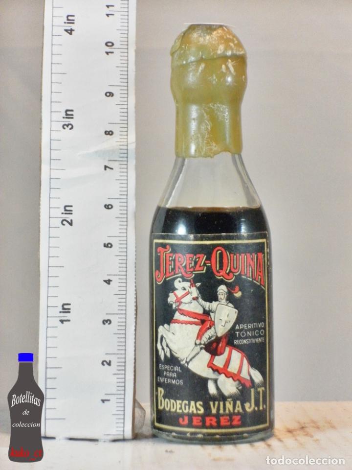Coleccionismo de vinos y licores: BOTELLITA BOTELLIN JEREZ QUINA TONICO BODEGAS VI&Ntilde;A J.T. JEREZ
