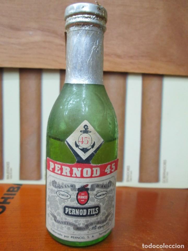 Collection of wines and liquors: ANTIGUO BOTELLIN, PERNOD 45- PENORD FILS
