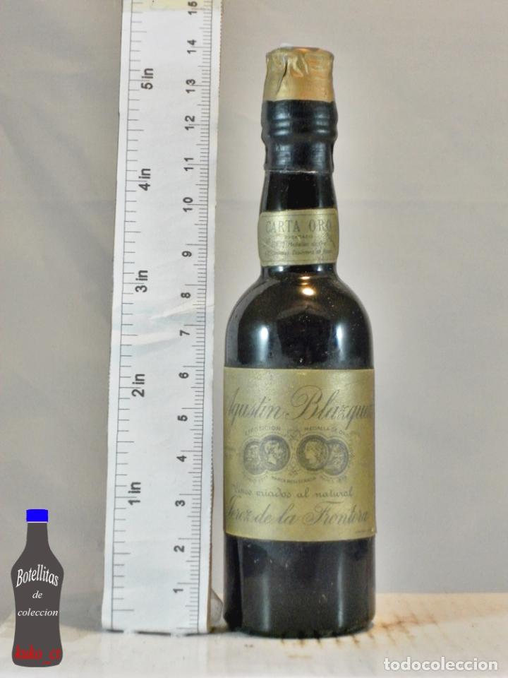 Sammlung von Weinen und Lik&ouml;ren: BOTELLITA BOTELLIN CARTA ORO AGUSTIN BLAZQUEZ JEREZ DE LA FRONTERA
