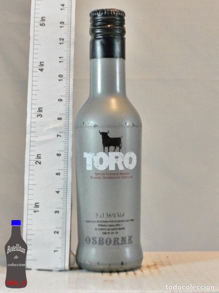 Coleccionismo de vinos y licores: BOTELLITA BOTELLIN BRANDY TORO BODEGAS OSBORNE PUERTO DE SANTA MARIA