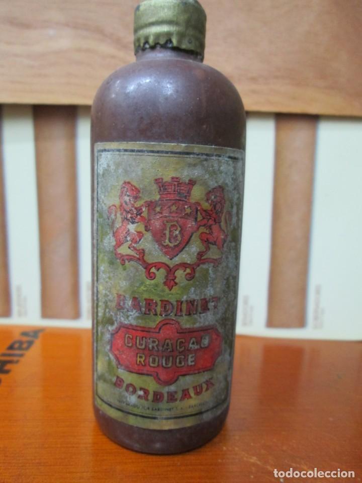 Collection of wines and liquors: ANTIGUO BOTELLIN,BARDINET CURACAO BORDEAUX
