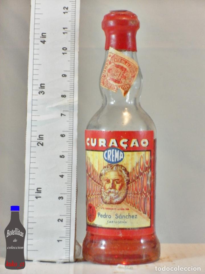 Coleccionismo de vinos y licores: BOTELLITA BOTELLIN CURACAO CREMA LICOR 49 PEDRO SANCHEZ CARTAGENA