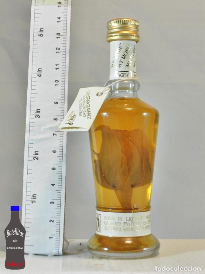 Sammlung von Weinen und Lik&ouml;ren: BOTELLITA BOTELLIN ROSA IN LIQUEUR CHRISTIAN DI MARCO ROSA HIDRATADA DENTRO