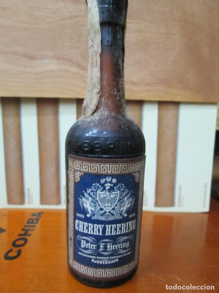 Collection of wines and liquors: ANTIGUO BOTELLIN, CHERRY HEERING