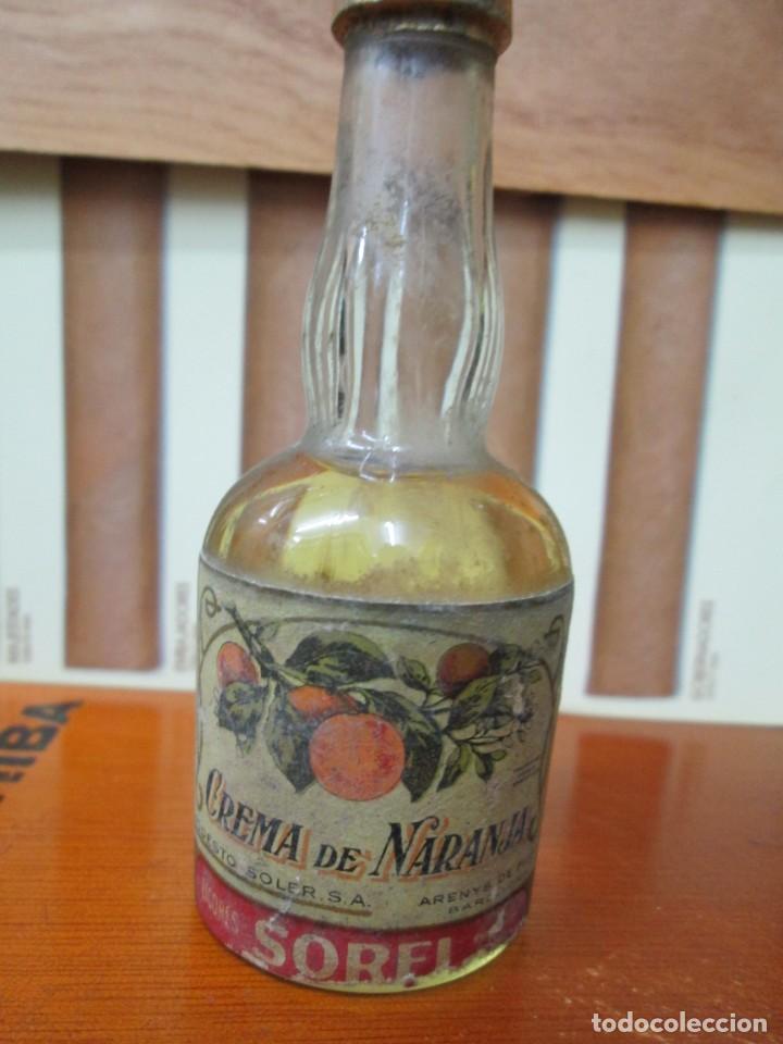 Collection of wines and liquors: ANTIGUO BOTELLIN, CREMA DE NARANJA SOREL