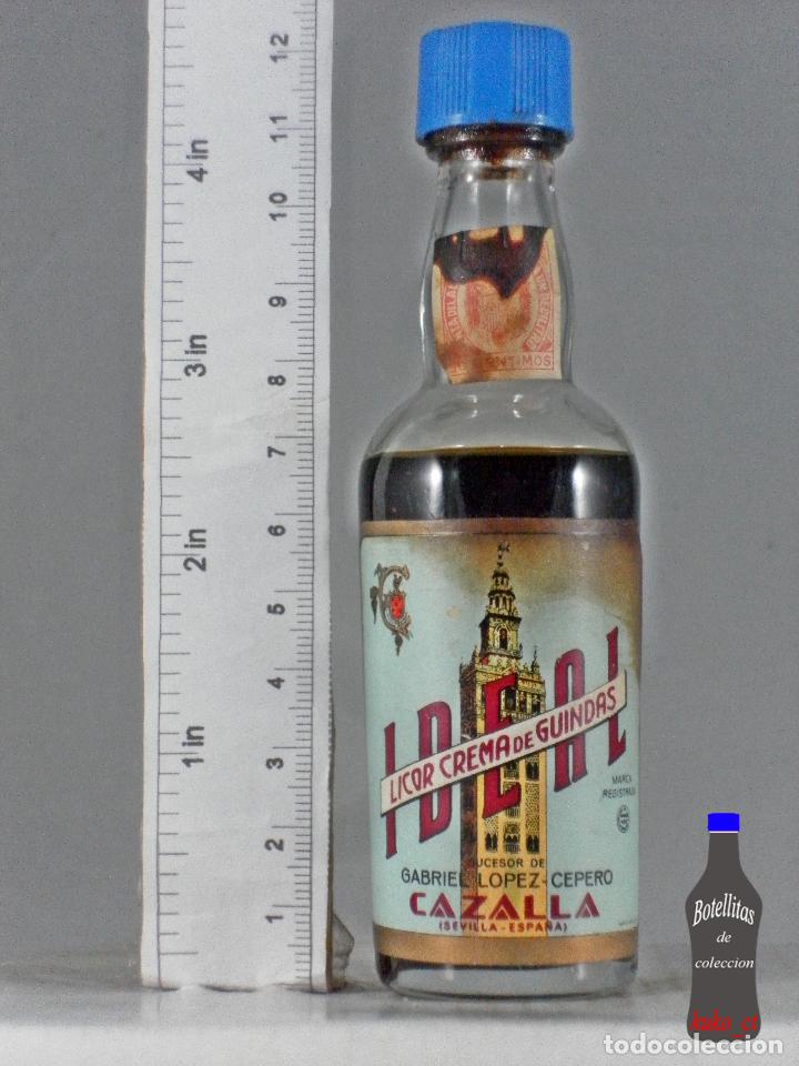 Coleccionismo de vinos y licores: BOTELLITA BOTELLIN LICOR CREMA DE GUINDAS IDEAL GABRIEL LOPEZ CEPERO CAZALLA